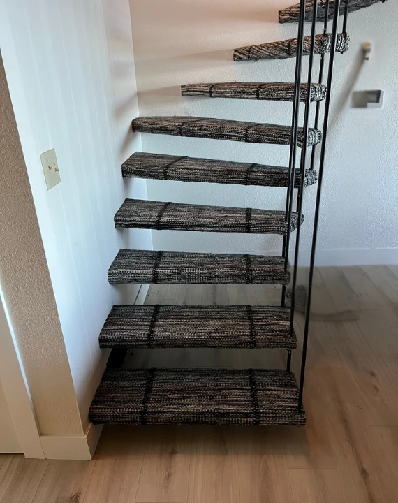 Stair runner installation.